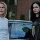 Rachael Taylor as Trish Walker and Krysten Ritter as Jessica Jones, expressing their disdain for something.